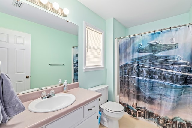 706 W Roxbury Rd, Dothan, AL 36305 - bathroom with vanity and toilet