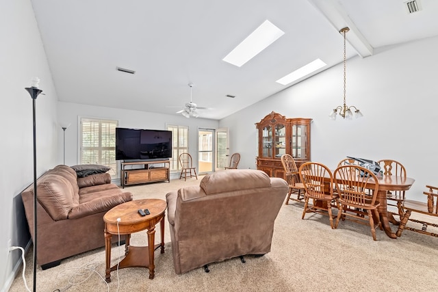 706 W Roxbury Rd, Dothan, AL 36305 - living room featuring light colored carpet, a skylight, a chandelier, and ceiling fan
