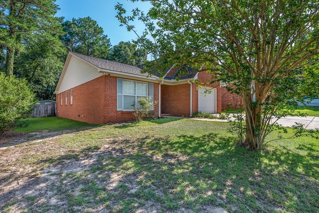 706 W Roxbury Rd, Dothan, AL 36305 - view of front of property with an attached garage and brick siding