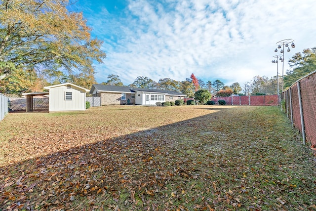 view of yard with a shed