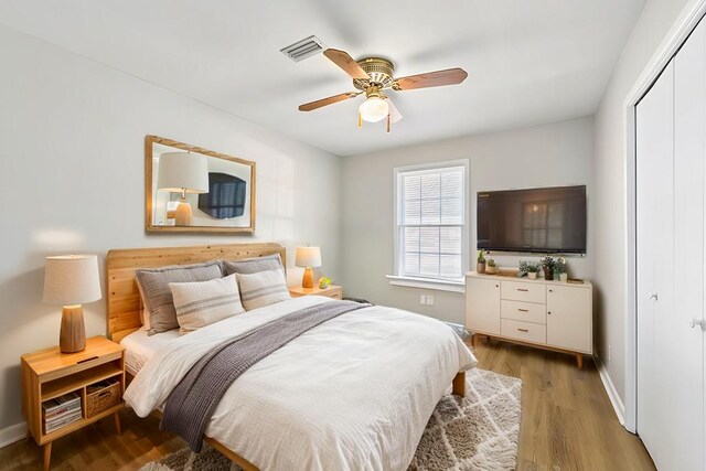 interior space featuring ceiling fan and built in desk