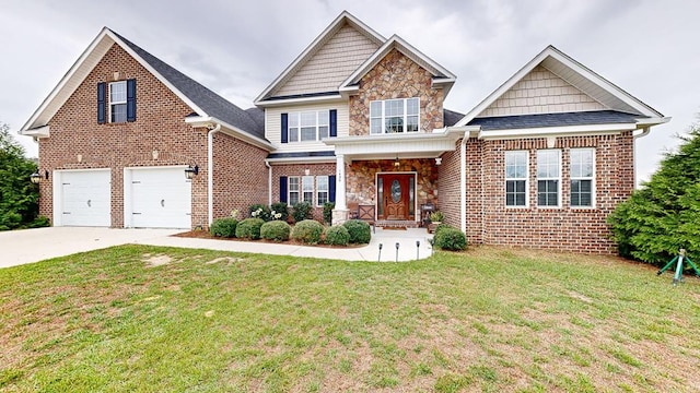 view of front of house featuring a garage and a front lawn