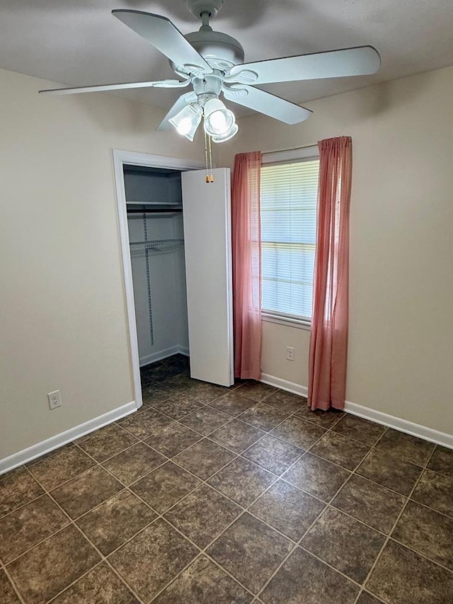 171 Merrydell Dr, Ozark, AL 36360 - unfurnished bedroom with ceiling fan and a closet