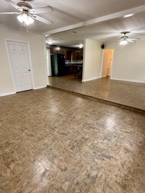 171 Merrydell Dr, Ozark, AL 36360 - unfurnished living room with ceiling fan and a textured ceiling