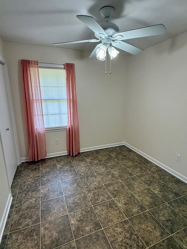 171 Merrydell Dr, Ozark, AL 36360 - spare room featuring a ceiling fan and baseboards