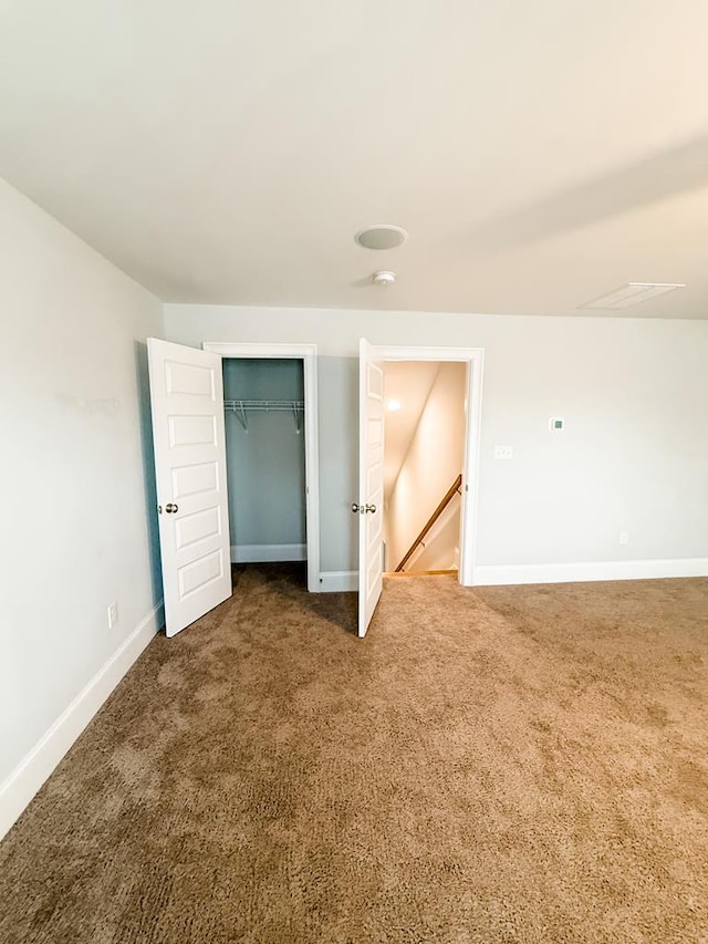 668 Charleston Mills Dr, Dothan, AL 36350 - carpeted spare room featuring baseboards and a smoke detector