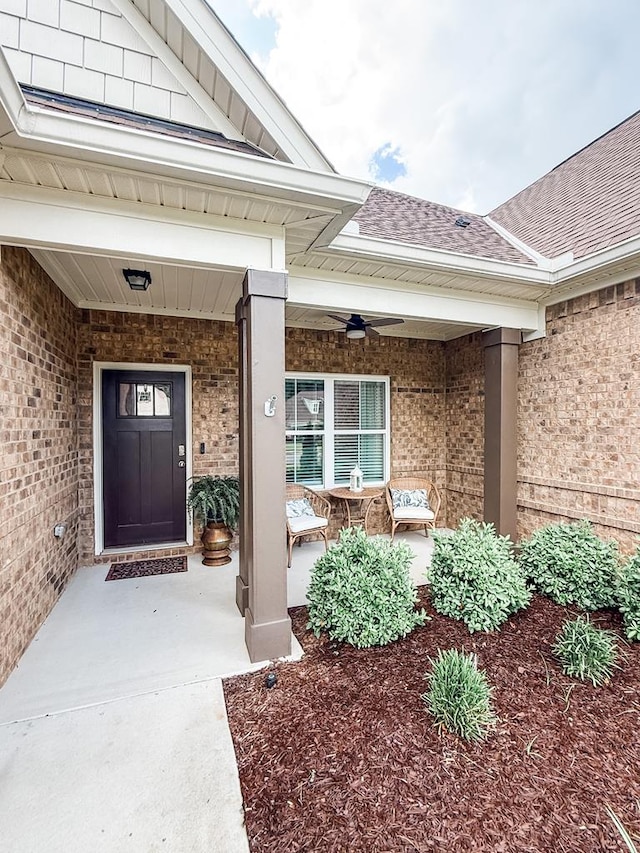 668 Charleston Mills Dr, Dothan, AL 36350 - entrance to property featuring a porch, brick siding, and a shingled roof