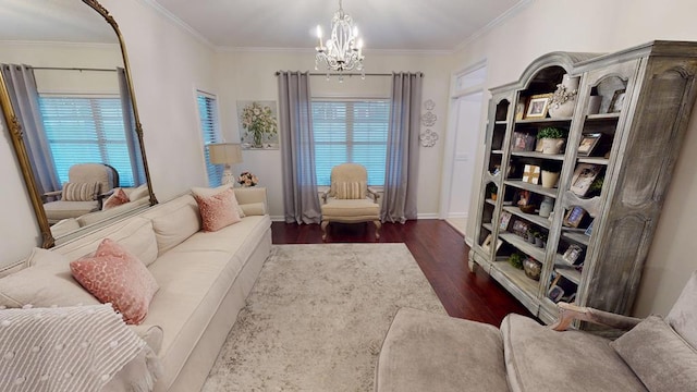 living room featuring a chandelier, a healthy amount of sunlight, wood finished floors, and crown molding