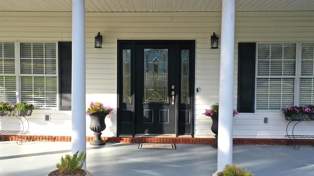 entrance to property with covered porch