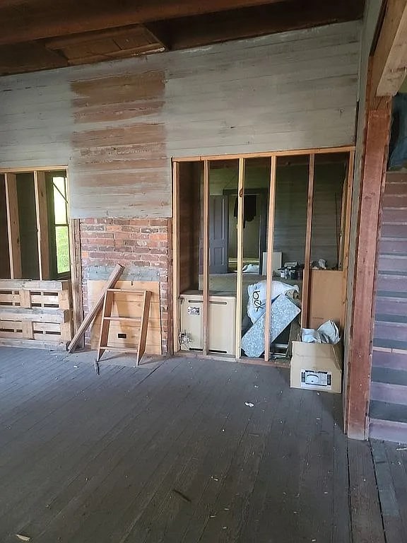 29040 Smiley St, Red Level, AL 36474 - miscellaneous room with wood-type flooring and wooden walls