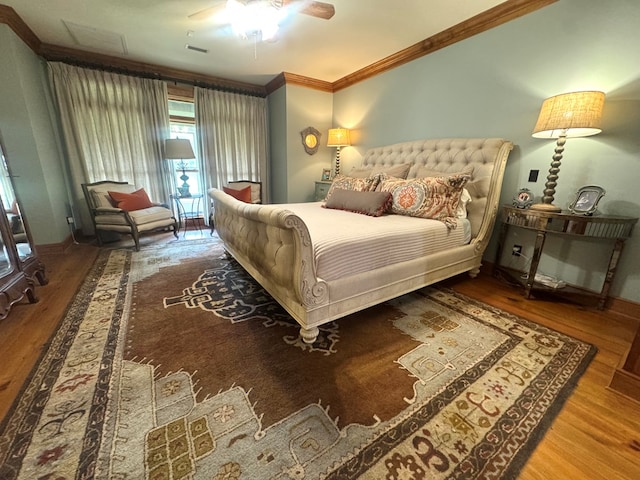 2837 Woodham Rd, Dothan, AL 36303 - bedroom featuring ornamental molding, wood finished floors, and a ceiling fan