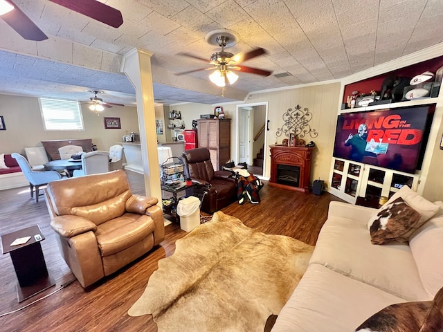 1503 Buena Vista Dr, Dothan, AL 36303 - living room featuring a ceiling fan, wood finished floors, a fireplace, and baseboards