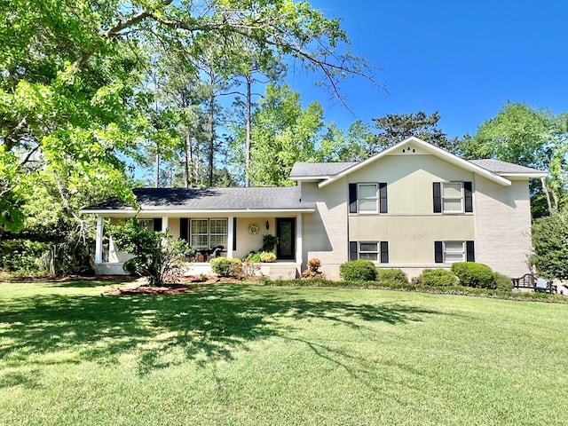 1503 Buena Vista Dr, Dothan, AL 36303 - tri-level home featuring a front yard and a porch