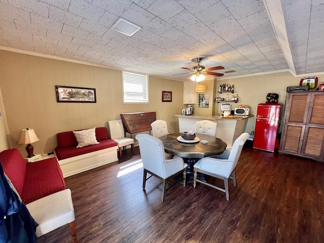 1503 Buena Vista Dr, Dothan, AL 36303 - dining room with wood finished floors, ceiling fan, and ornamental molding