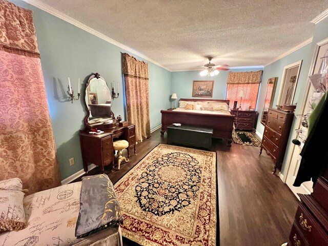 1503 Buena Vista Dr, Dothan, AL 36303 - bedroom featuring wood finished floors, ornamental molding, baseboards, a textured ceiling, and a ceiling fan