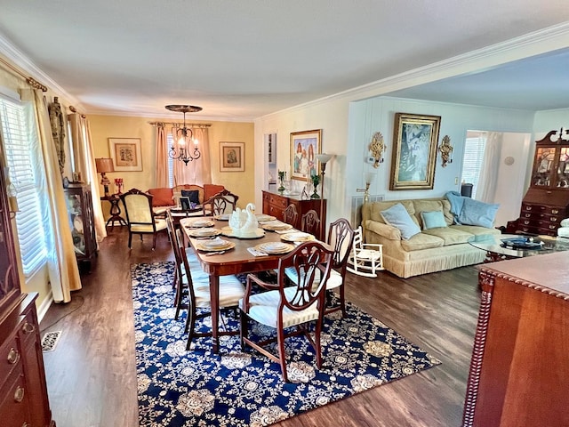 1503 Buena Vista Dr, Dothan, AL 36303 - dining space with crown molding, a chandelier, and dark wood finished floors