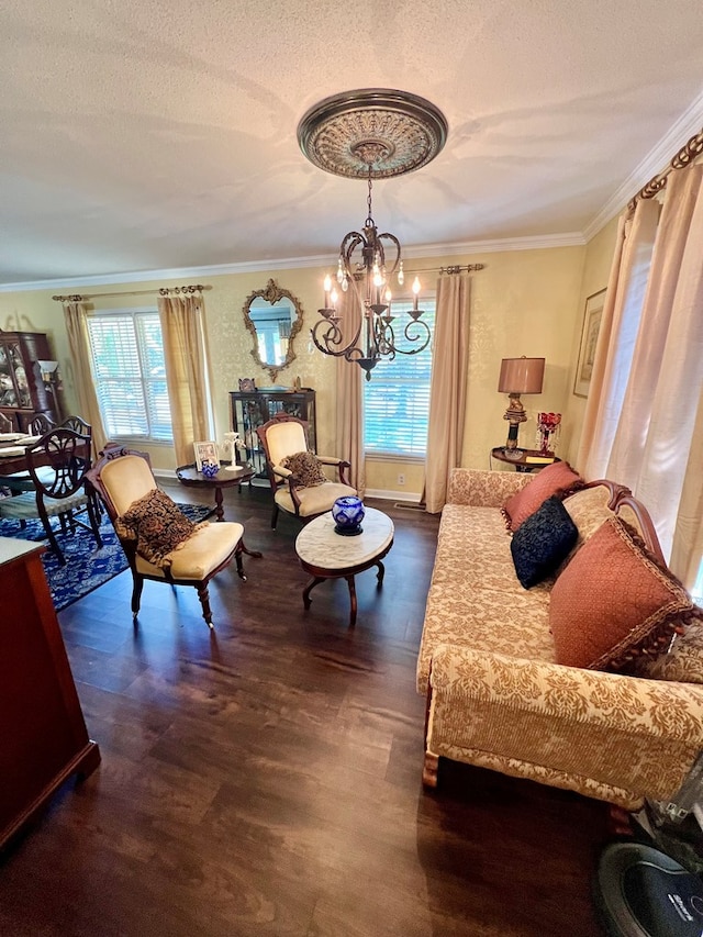 1503 Buena Vista Dr, Dothan, AL 36303 - living area featuring a chandelier, wood finished floors, healthy amount of natural light, crown molding, and a textured ceiling