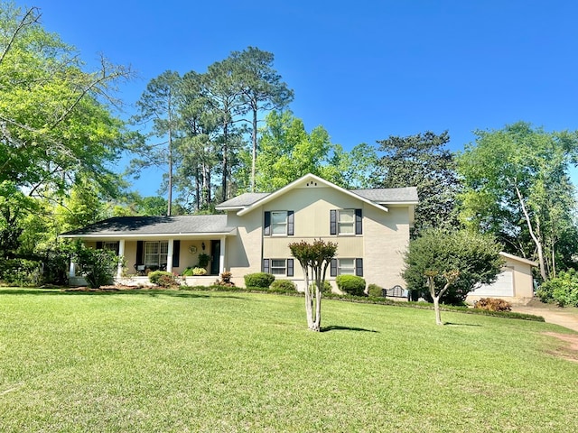 1503 Buena Vista Dr, Dothan, AL 36303 - split level home featuring a front lawn and stucco siding