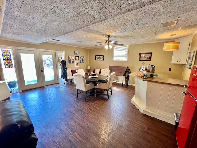 1503 Buena Vista Dr, Dothan, AL 36303 - dining room featuring dark wood finished floors, a ceiling fan, french doors, and crown molding