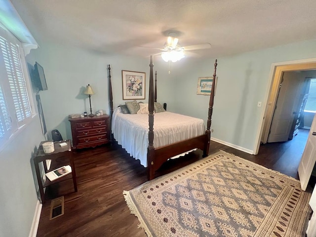 1503 Buena Vista Dr, Dothan, AL 36303 - bedroom with dark wood-style floors, baseboards, and multiple windows