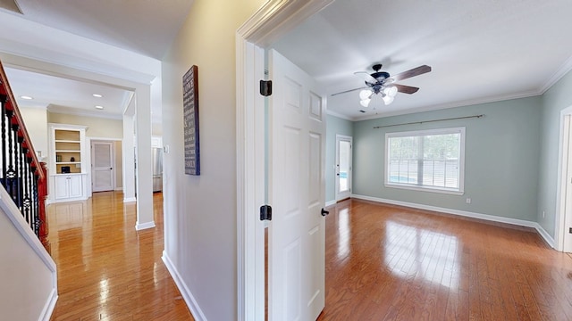 107 Boulder Dr, Dothan, AL 36305 - hall featuring light wood-style floors, ornamental molding, baseboards, stairs, and recessed lighting