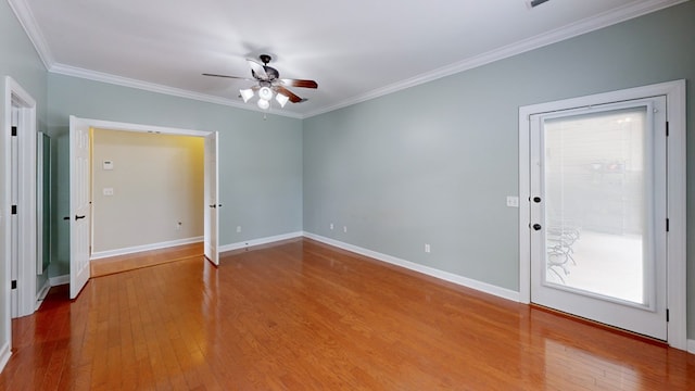107 Boulder Dr, Dothan, AL 36305 - empty room with ceiling fan, wood finished floors, crown molding, and baseboards
