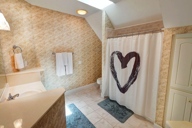 221 Asphodel Dr, Dothan, AL 36303 - full bath with vanity, tile patterned floors, lofted ceiling, and a shower with shower curtain