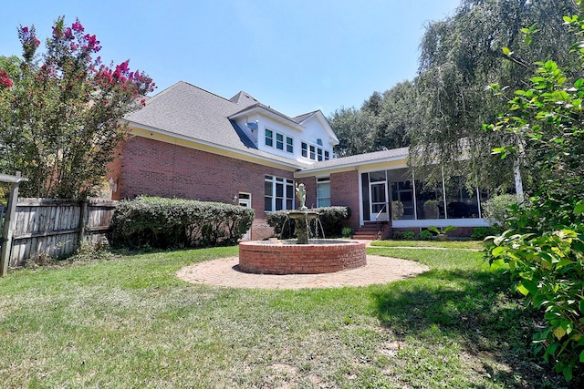 221 Asphodel Dr, Dothan, AL 36303 - back of house featuring a sunroom and brick siding