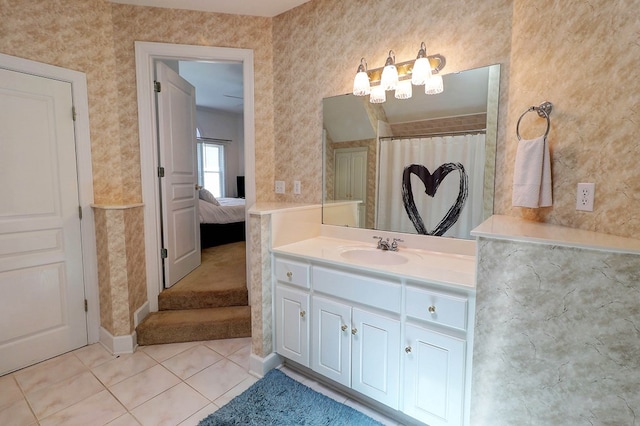 221 Asphodel Dr, Dothan, AL 36303 - ensuite bathroom featuring vanity, tile patterned flooring, and a chandelier
