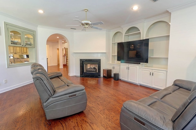 221 Asphodel Dr, Dothan, AL 36303 - living room with a ceiling fan, dark wood finished floors, arched walkways, recessed lighting, and crown molding