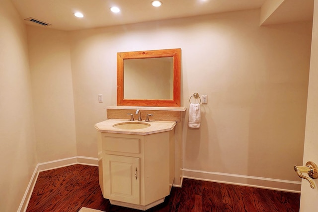 221 Asphodel Dr, Dothan, AL 36303 - bathroom featuring wood finished floors, vanity, and recessed lighting