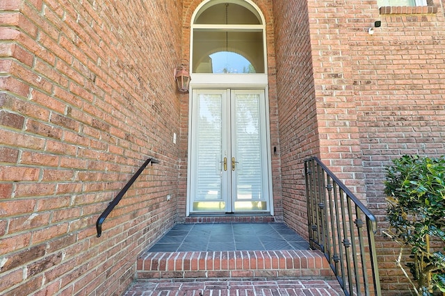 221 Asphodel Dr, Dothan, AL 36303 - view of exterior entry with french doors and brick siding