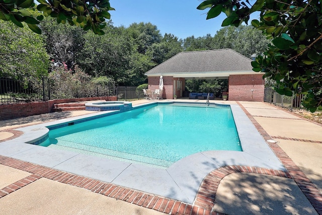 221 Asphodel Dr, Dothan, AL 36303 - view of swimming pool with a fenced backyard, a patio, a pool with connected hot tub, and an outdoor structure