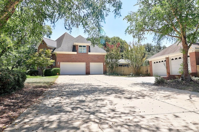 221 Asphodel Dr, Dothan, AL 36303 - traditional-style home with concrete driveway and brick siding