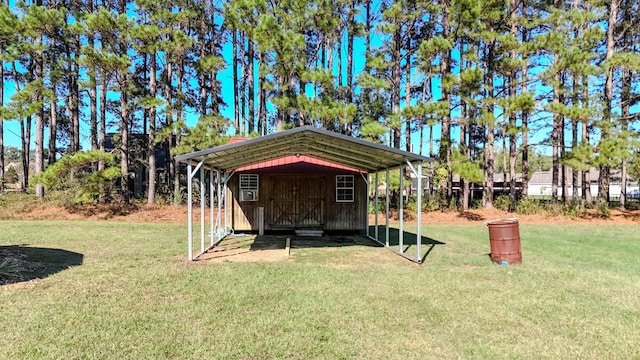 view of outbuilding with a carport and a yard