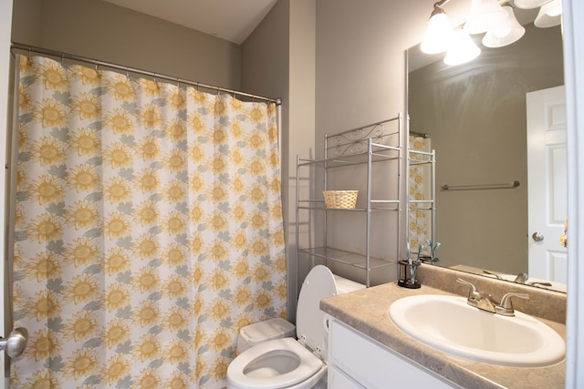 bathroom with a shower with curtain, vanity, and toilet