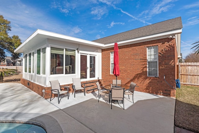 back of house with a patio