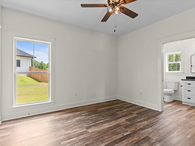 328 Lakes Dr, Enterprise, AL 36330 - unfurnished bedroom featuring baseboards, ensuite bath, and wood finished floors