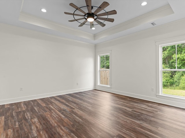328 Lakes Dr, Enterprise, AL 36330 - spare room featuring crown molding, dark wood-style flooring, and a raised ceiling