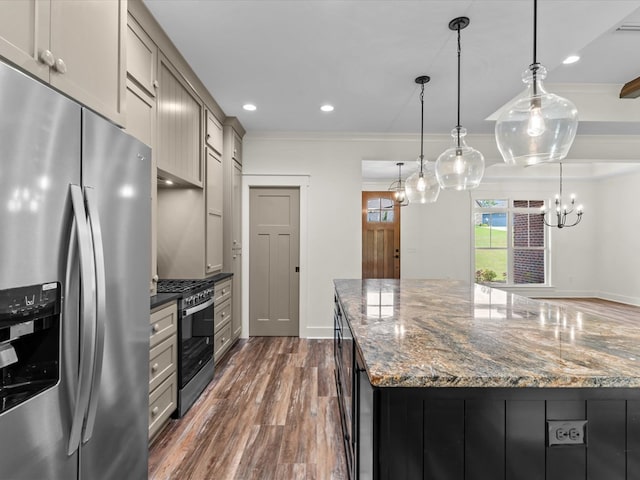 328 Lakes Dr, Enterprise, AL 36330 - kitchen featuring dark wood-style flooring, appliances with stainless steel finishes, a kitchen island, ornamental molding, and recessed lighting