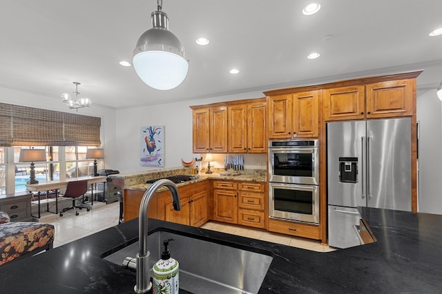 kitchen with stainless steel appliances, crown molding, pendant lighting, a chandelier, and light tile patterned flooring