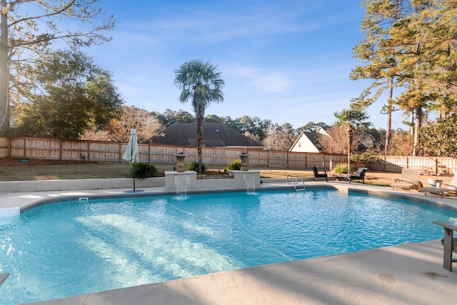 view of pool with pool water feature