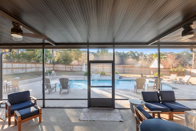 sunroom / solarium with ceiling fan