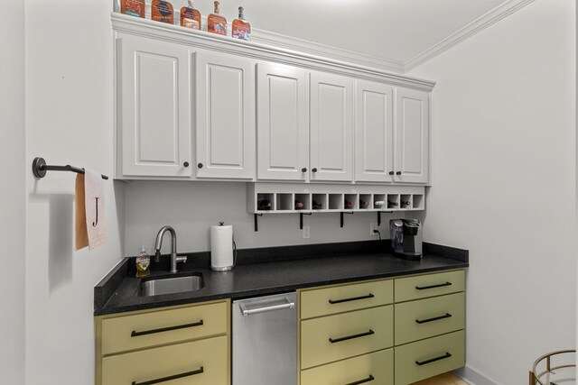 bar with white cabinetry, sink, and ornamental molding