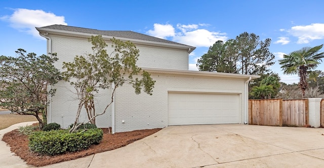 view of side of property featuring a garage