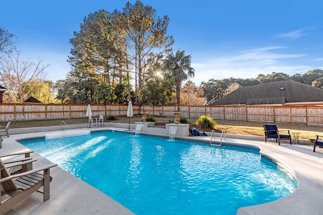 view of swimming pool featuring a patio area and pool water feature