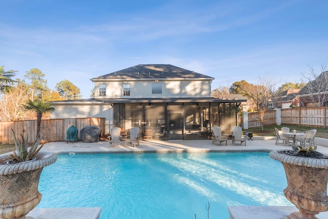 view of swimming pool featuring a patio area