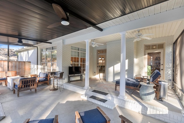 view of patio / terrace with an outdoor living space and ceiling fan