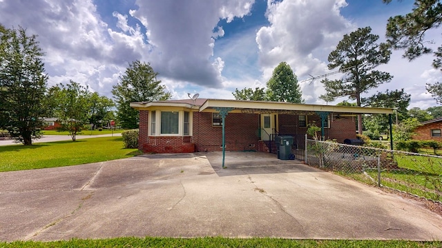 505 Massee Dr, Dothan, AL 36301 - ranch-style house with brick siding and a carport