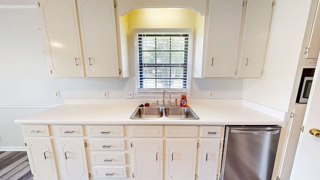 505 Massee Dr, Dothan, AL 36301 - kitchen with dishwasher, light countertops, and white cabinetry